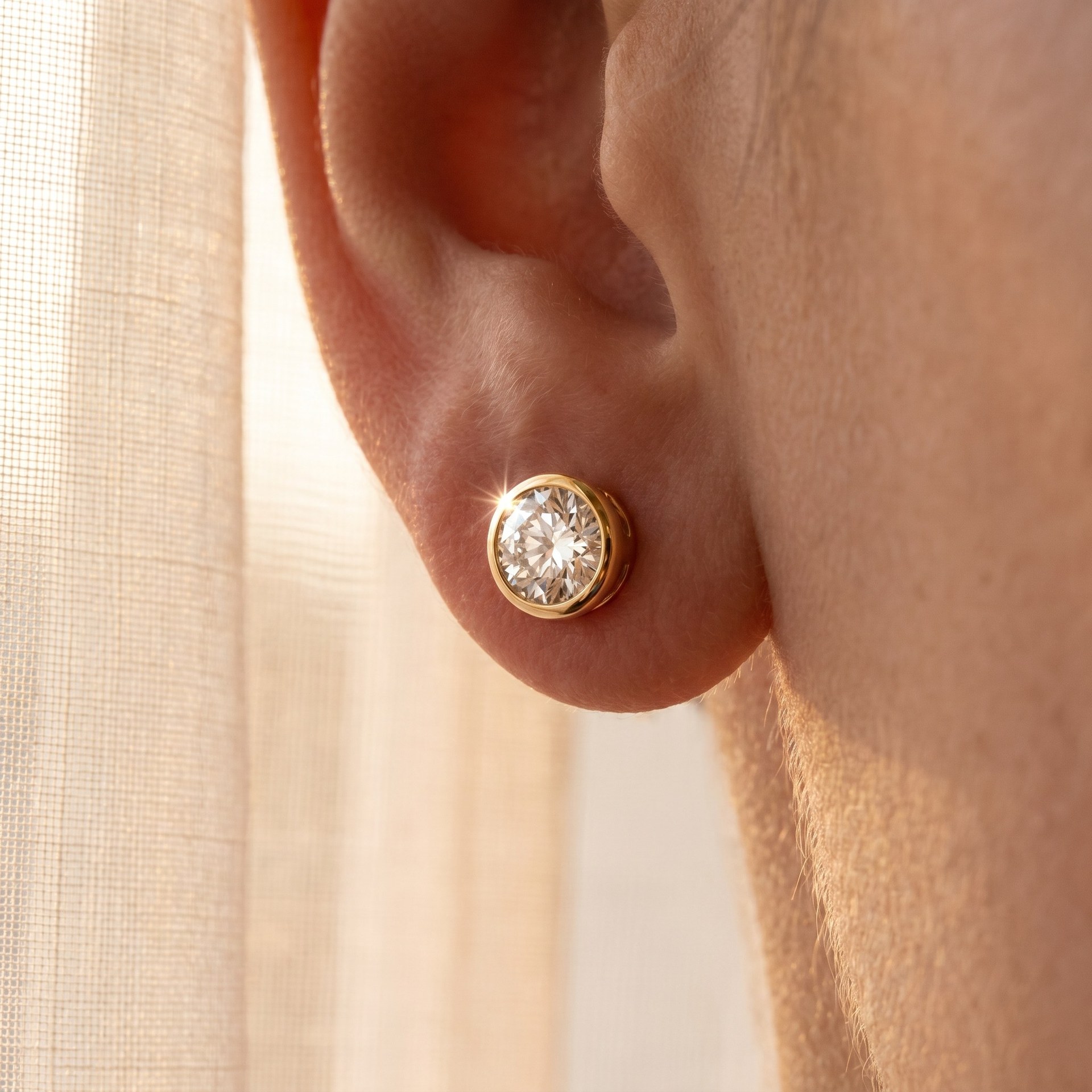 A solitaire ring in low, raking light that emphasises the cut of the stone.