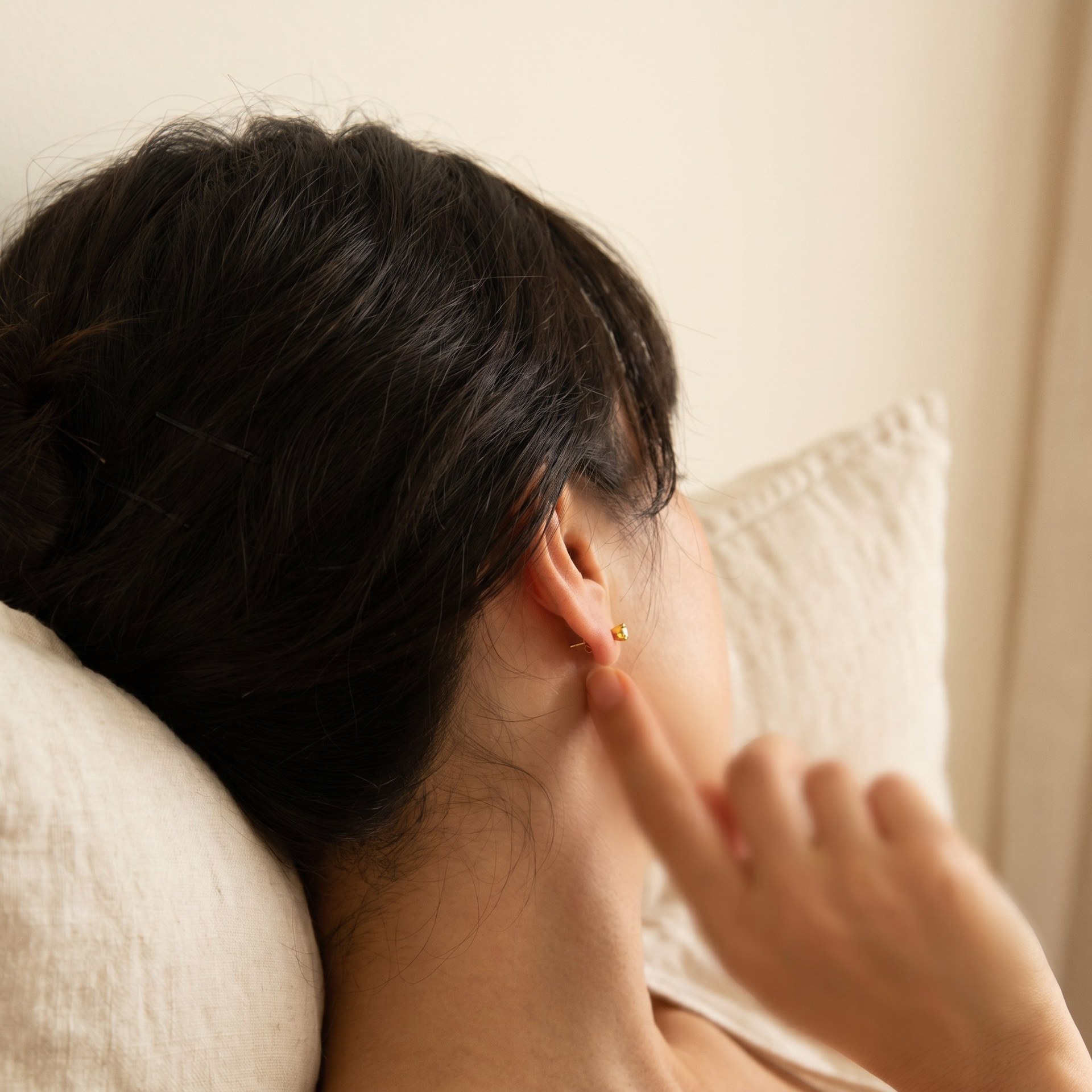 A finished piece set down on linen at the end of a working day in the atelier.